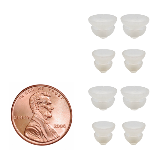 Signia Silk and Sony CRE hearing aid double domes pack of 12 transparent beside a penny various sizes